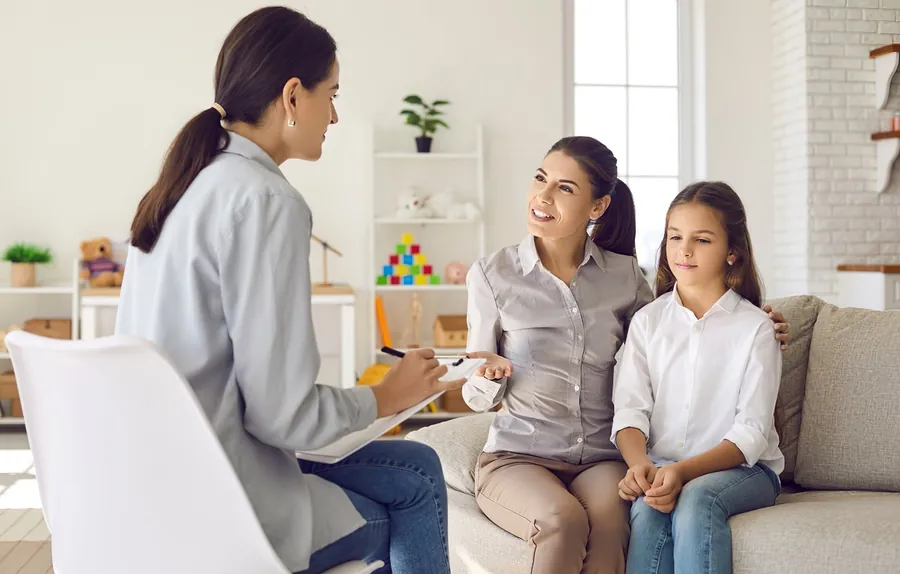 A parent and child working together during a learning support session